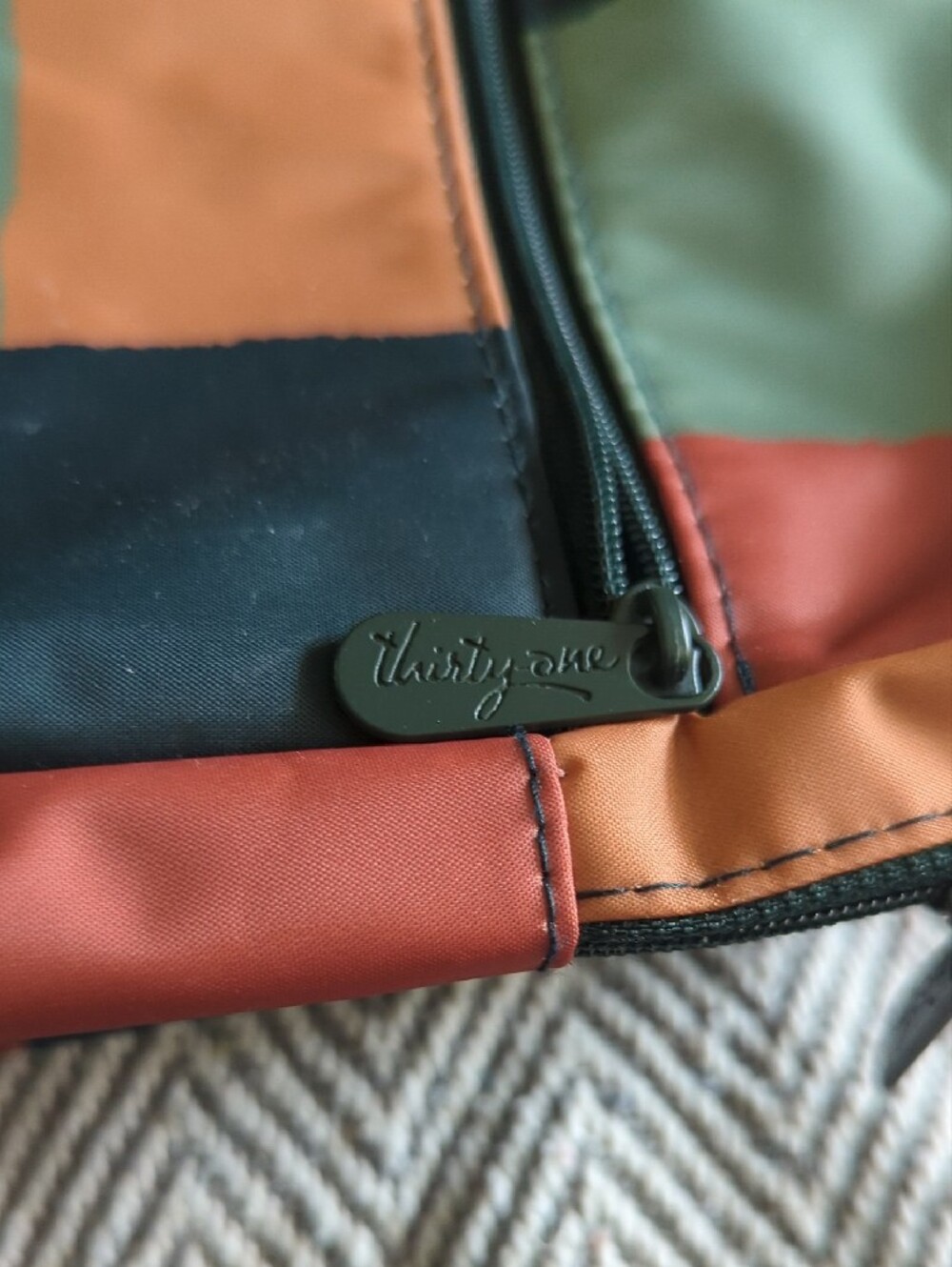 thirty-one Colorblock Zipper Pouch in Rust, Black & Olive - Picture 2 of 5